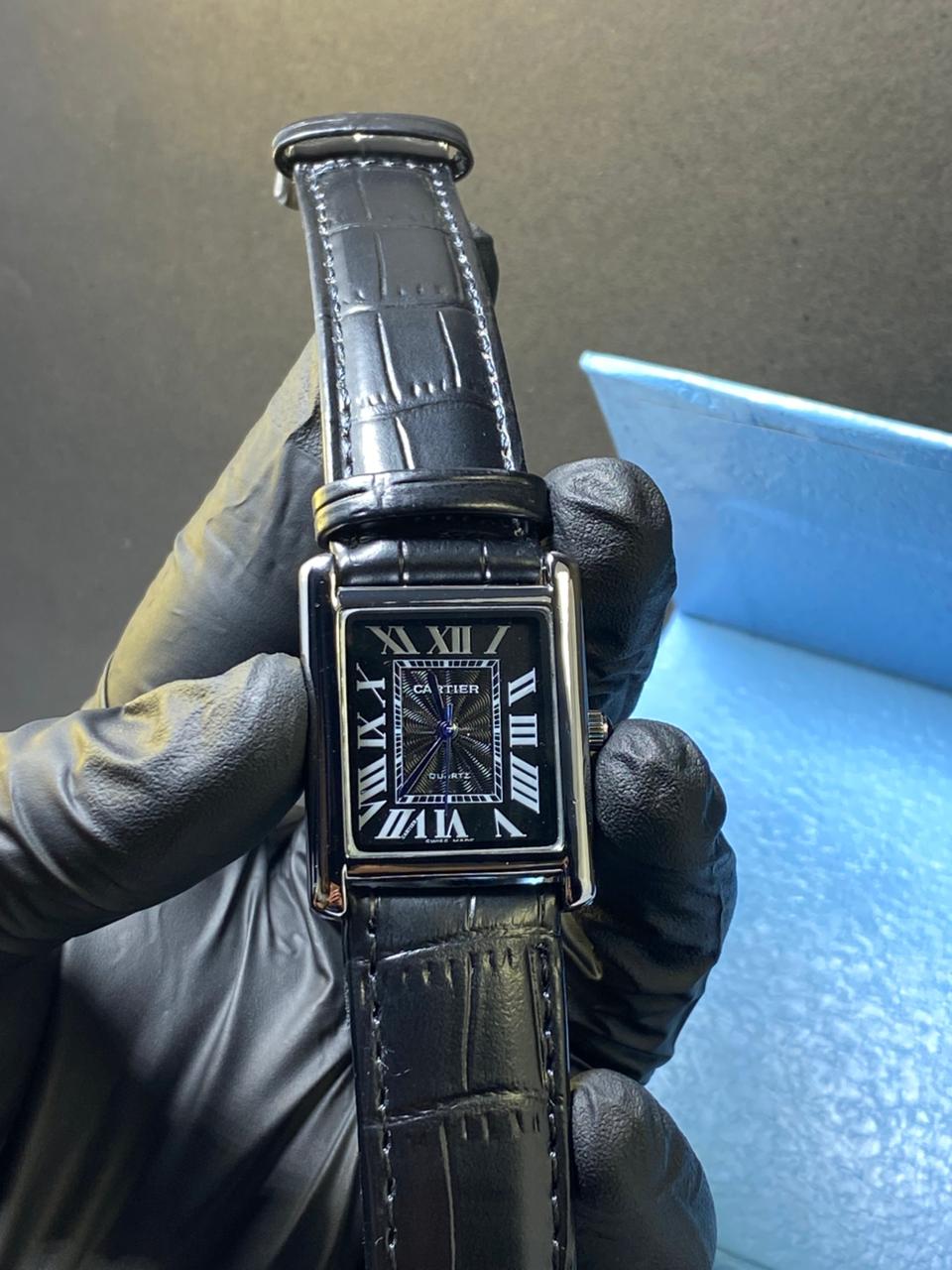 Cartier Tank black with Black dial